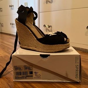 Lace up black wedges